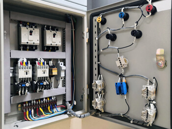 Close up view inside a fabricated control panel